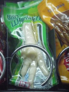 Why yes, this is a chicken foot in a vending machine. What, is that odd?