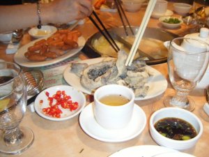 A small sampling of some of the goodies we dumped into the pot of boiling water at hot pot. Fried fish skin and sausages are the only foods I can identify here.