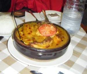 Macanese baked chicken with coconut, tumeric and potatoes.