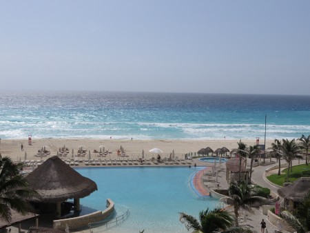 The view of the hotel pool and ocean from our room's balcony. Don't deny you're jealous.