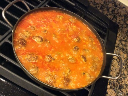 orzo pasta and meatball soup in the pot