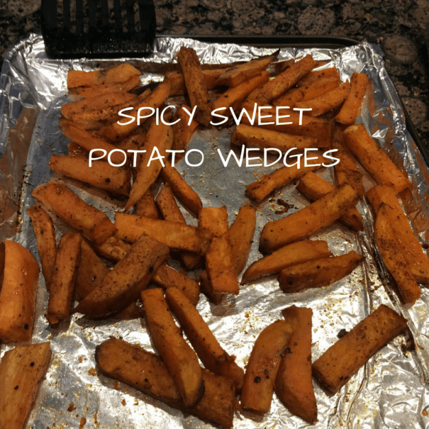 spicy sweet potato wedges on baking sheet